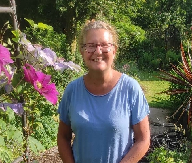 tracey stood in a garden
